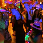 Black light show with glow stick wedding entertainment favors.